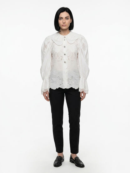 Blouse by Dolce & Gabbana for women in cotton linen & polyester white presents a discerning silhouette, showcasing a sophisticated and for a truly discerning finish.