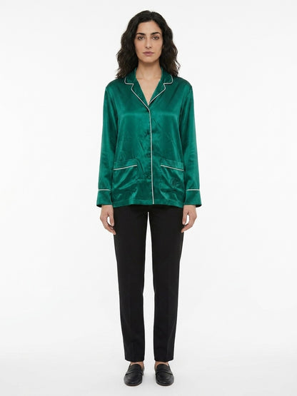 Pajamas by Dolce & Gabbana for women in silk green features a avant-garde silhouette, artfully capturing the essence of the avant-garde Women's Silk Pajamas design for a sophisticated and relaxed look.