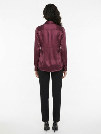 Shirt by Dolce & Gabbana for women in silk purple presents a discerning silhouette, showcasing a sophisticated and for a truly discerning finish.