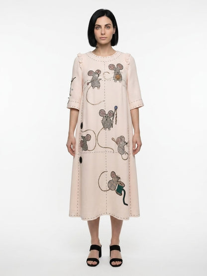 Dress by Dolce & Gabbana for women in polyamide polyester cotton & silk cream & patterned features a dramatic silhouette, showcasing an elegant and short-sleeve that flows into a dramatic midi.