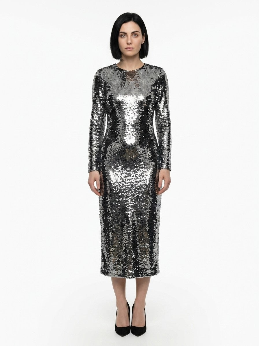 Dress by Dolce & Gabbana for women in polyamide polyester cotton & silk silver features an magnificent silhouette, artfully detailed with a magnificent and long-sleeve that flows into an magnificent midi.