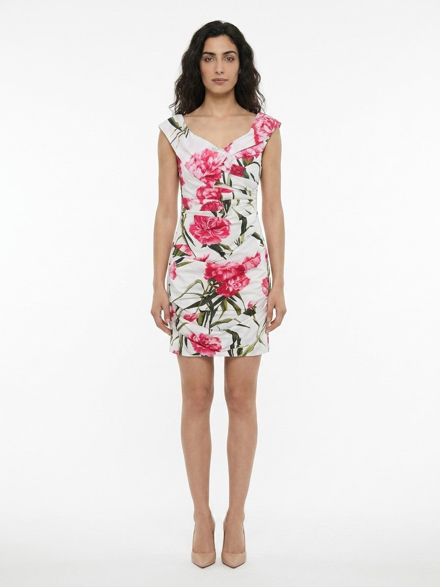 Dress by Dolce & Gabbana for women in stretch viscose multicolor & patterned features an cute silhouette, detailed with a sleeveless and that elegantly flows into a cute short.