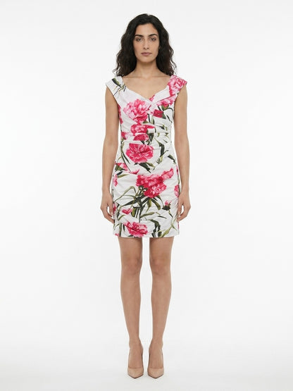 Dress by Dolce & Gabbana for women in stretch viscose multicolor & patterned features an cute silhouette, detailed with a sleeveless and that elegantly flows into a cute short.