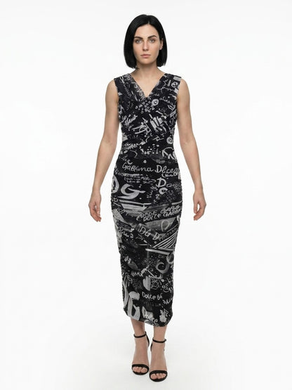 Dress by Dolce & Gabbana for women in stretch polyamide bicolour, patterned & signature features an eye catching silhouette with a sophisticated , elegant sleeveless, and a refined midi for a eye catching aesthetic.