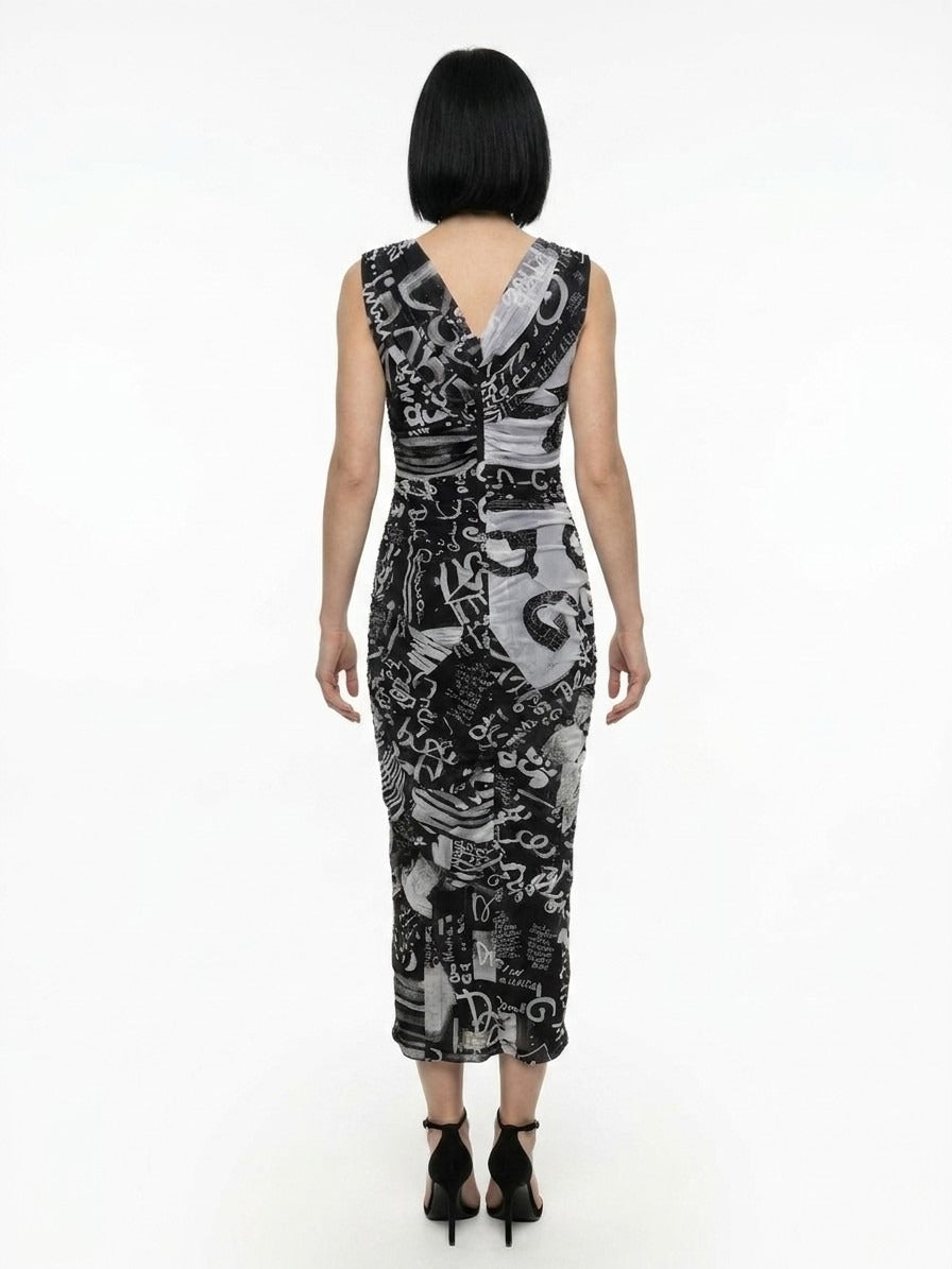 Dress by Dolce & Gabbana for women in stretch polyamide bicolour, patterned & signature presents a sinuous silhouette, showcasing a sophisticated and detailed with a sinuous midi for a refined finish.