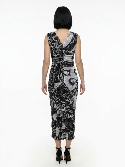 Dress by Dolce & Gabbana for women in stretch polyamide bicolour, patterned & signature presents a sinuous silhouette, showcasing a sophisticated and detailed with a sinuous midi for a refined finish.