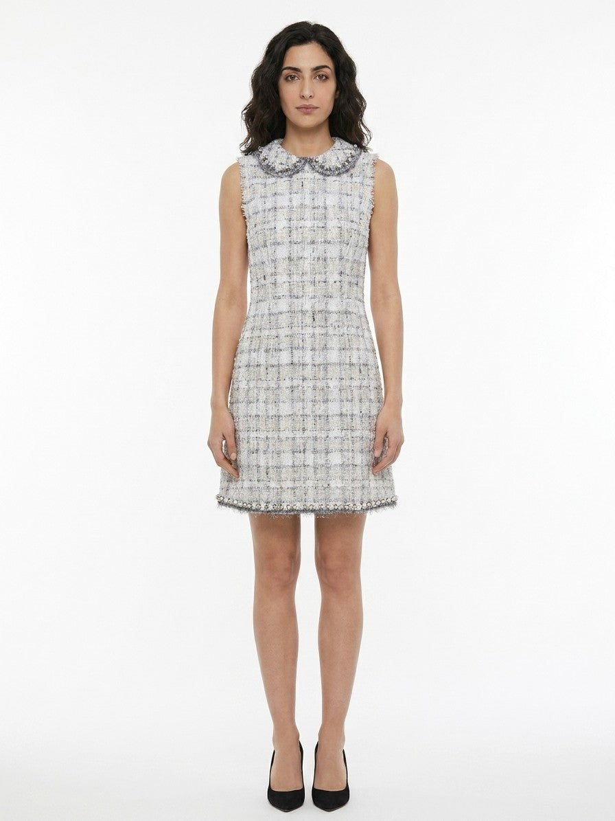Dress by Dolce & Gabbana for women in polyester cotton viscose & silk multicolor features a dramatic silhouette, showcasing an elegant and sleeveless that flows into a dramatic short.
