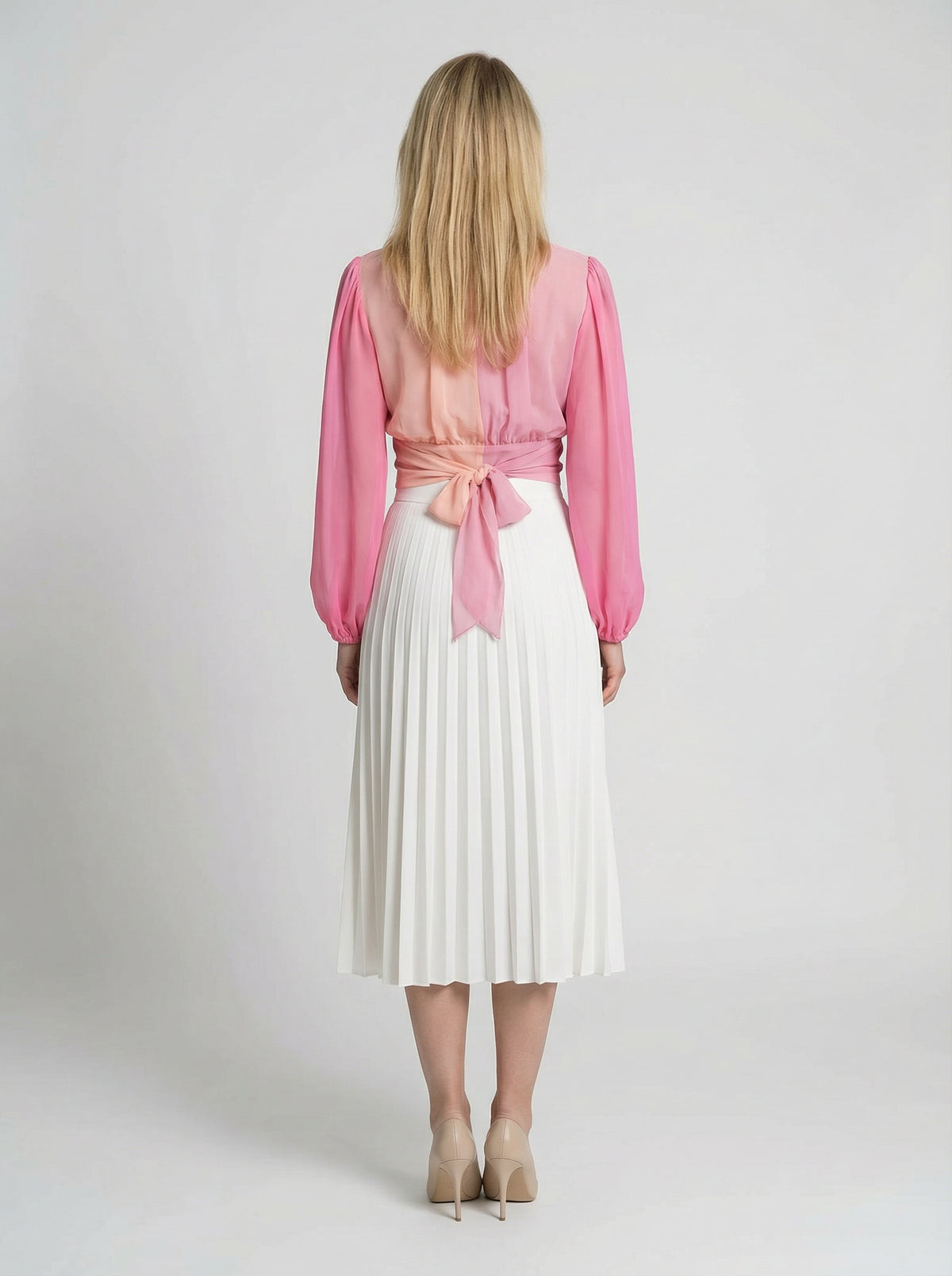 Skirt by Dolce & Gabbana for women in silk pink features a captivating silhouette, showcasing the captivating Essence Women's Silk Midi Skirt design with a sophisticated midi for a captivating look.