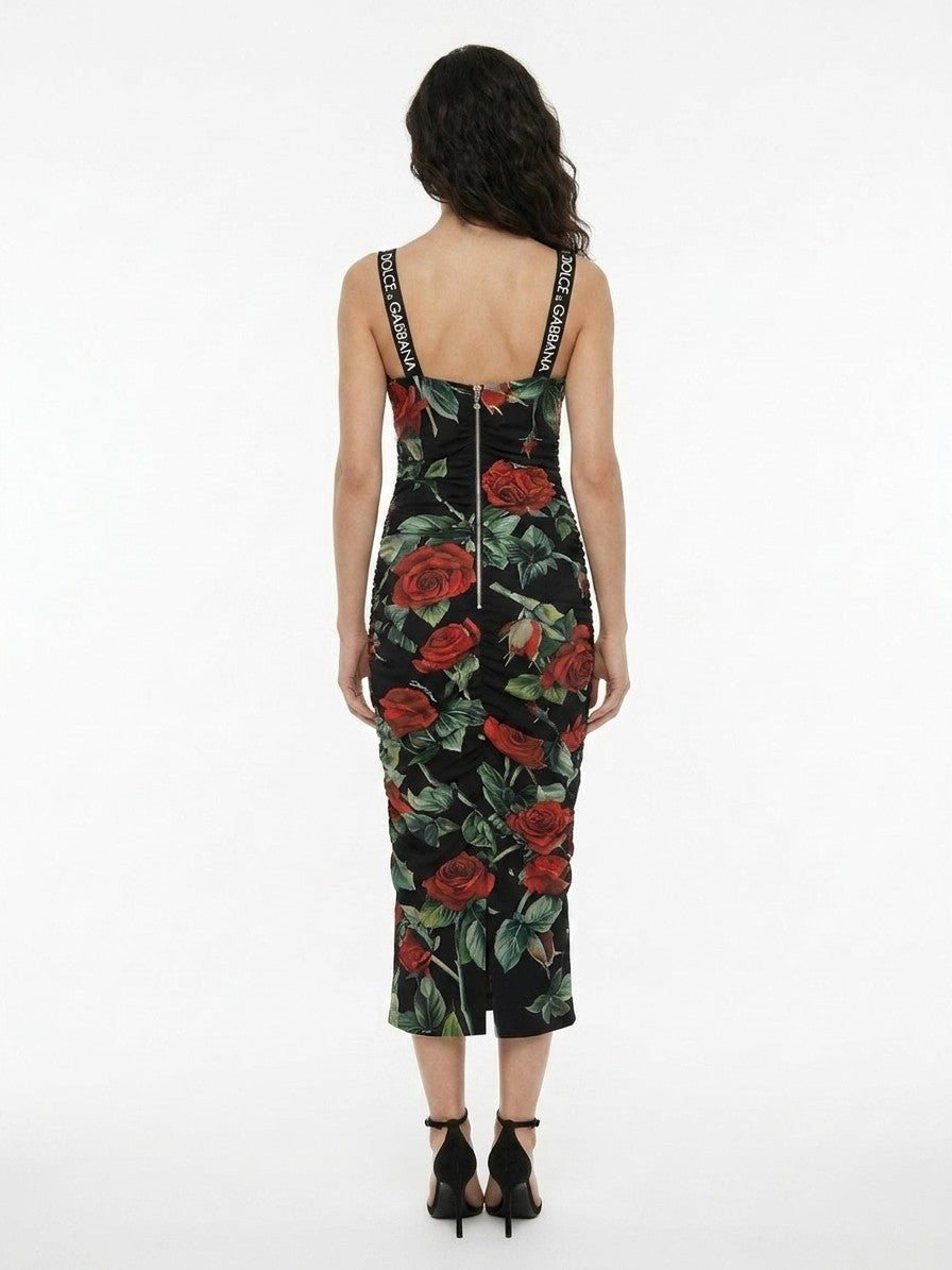 Dress by Dolce & Gabbana for women in silk multicolor & patterned features an magnificent silhouette, artfully detailed with a magnificent and that flows into an magnificent midi.