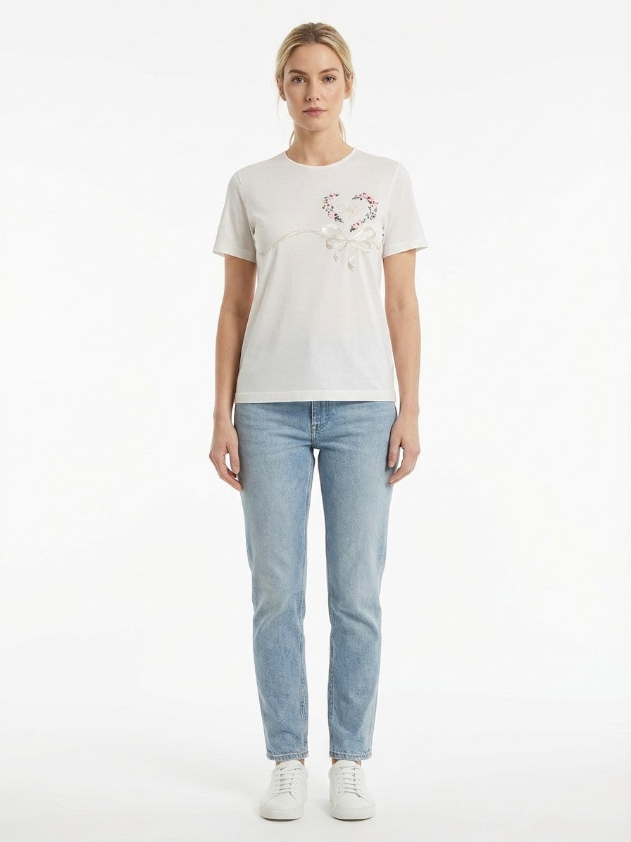 T-Shirt by Dolce & Gabbana for women in denim & silk white showcases a fashionable silhouette, elegantly detailed with a fashionable and for a sophisticated, high-fashion look.