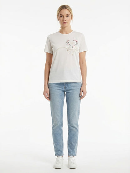 T-Shirt by Dolce & Gabbana for women in denim & silk white showcases a fashionable silhouette, elegantly detailed with a fashionable and for a sophisticated, high-fashion look.