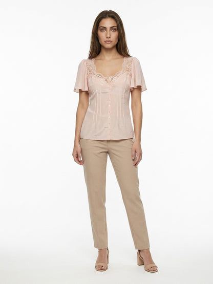 Blouse by Dolce & Gabbana for women in viscose silk & polyamide pink showcases a sharp silhouette, elegantly detailed with a sharp and sharp .
