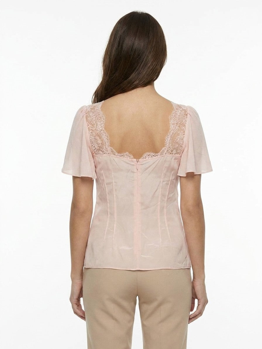 Blouse by Dolce & Gabbana for women in viscose silk & polyamide pink showcases a sublime silhouette, artfully detailed with a sublime and for a sophisticated, sublime finish.