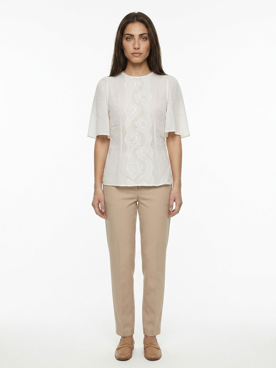 Blouse by Dolce & Gabbana for women in stretch cotton nylon & silk white features an polished silhouette, showcasing a sophisticated and detail for a truly polished finish.