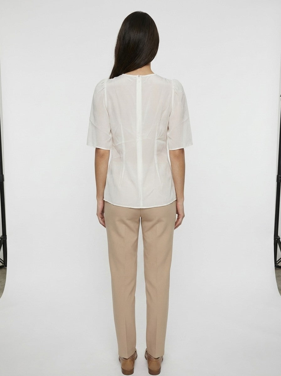 Blouse by Dolce & Gabbana for women in stretch cotton nylon & silk white, featuring a nuanced and nuanced for a sophisticated finish.