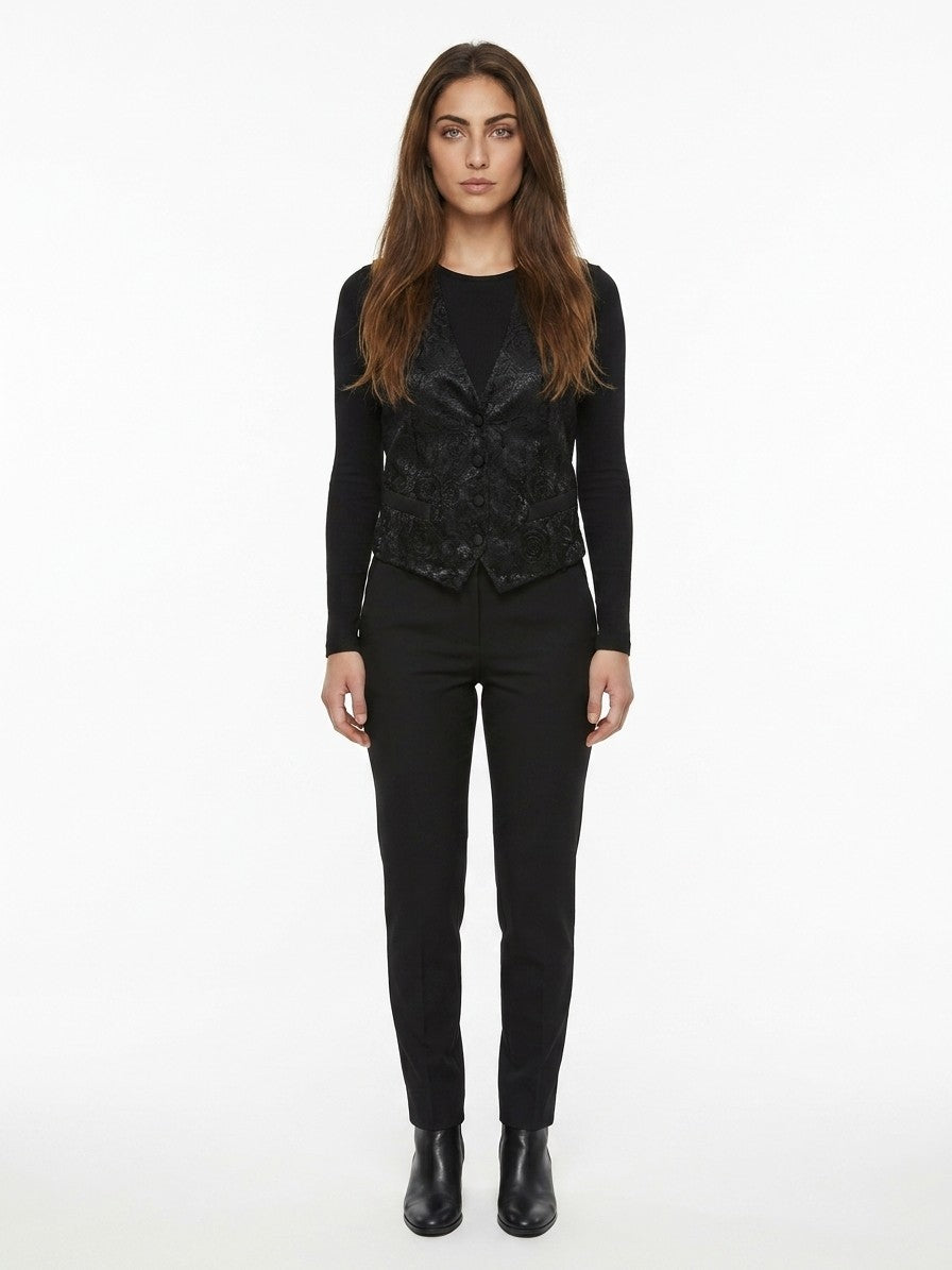 Vest by Dolce & Gabbana for women in polyester cotton viscose & silk black showcases a utilitarian silhouette, artfully incorporating and a utilitarian for a truly utilitarian finish.