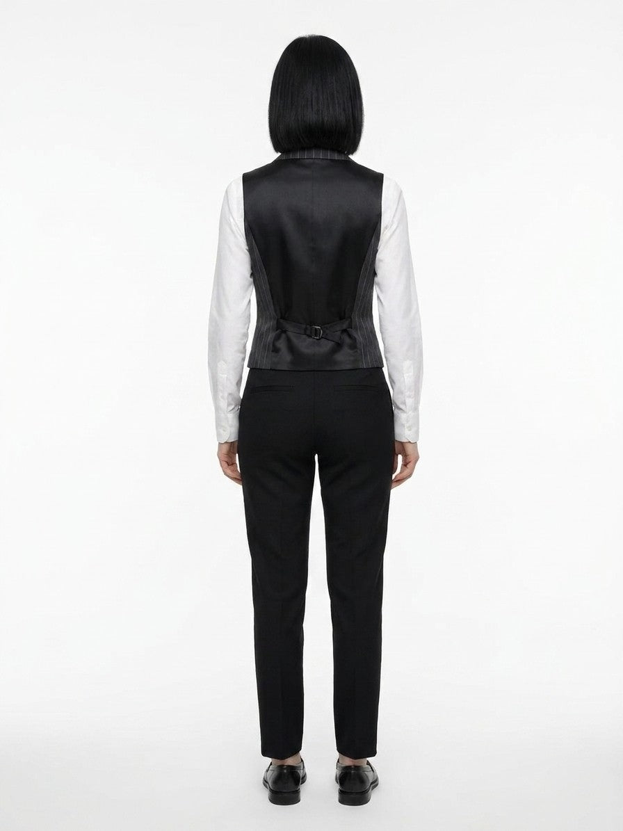 Vest by Dolce & Gabbana for women in virgin wool & silk multicolor showcases a dynamic silhouette, perfectly balancing with a dynamic for a sophisticated, high-fashion look.