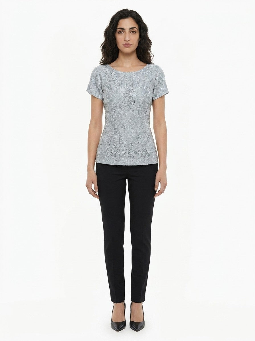 Blouse by Dolce & Gabbana for women in polyamide polyester & silk light-blue presents a discerning silhouette, showcasing a sophisticated and for a truly discerning finish.