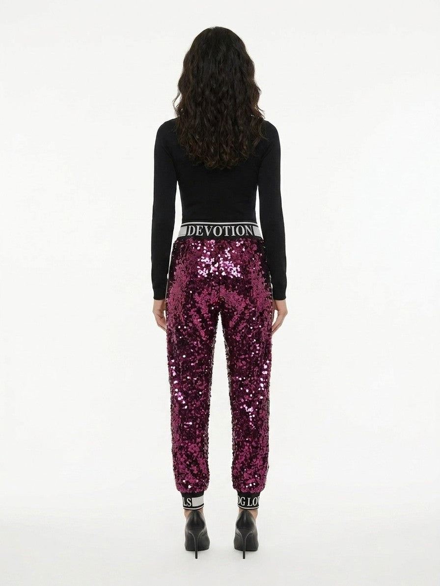 Trousers by Dolce & Gabbana for women in silk & polyester pink features an sartorial silhouette, showcasing a precise and long with a sartorial for a refined look.