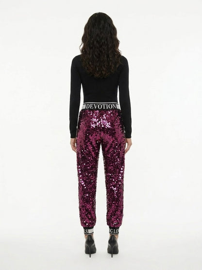 Trousers by Dolce & Gabbana for women in silk & polyester pink features an sartorial silhouette, showcasing a precise and long with a sartorial for a refined look.