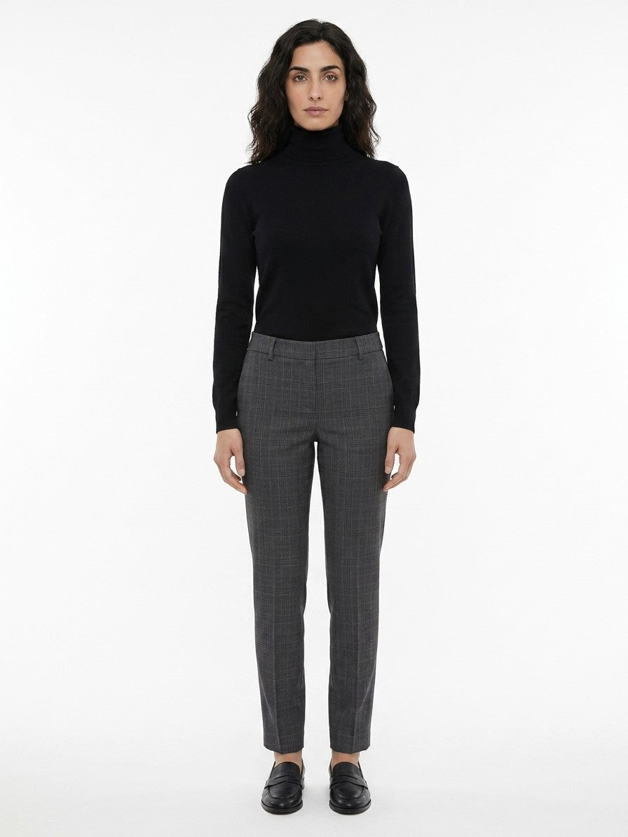 Trousers by Dolce & Gabbana for women in virgin wool multicolor presents a smart silhouette, meticulously detailed with a smart flared, a smart long, and a smart .