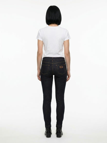 Jeans by Dolce & Gabbana for women in stretch denim cotton blue features a polished silhouette with a polished skinny, reaching a polished long and finished with a polished .