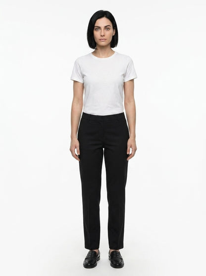 Joggers by Dolce & Gabbana for women in stretch cotton black presents a tailored silhouette, showcasing a tailored and long cut with a refined for a truly tailored aesthetic.