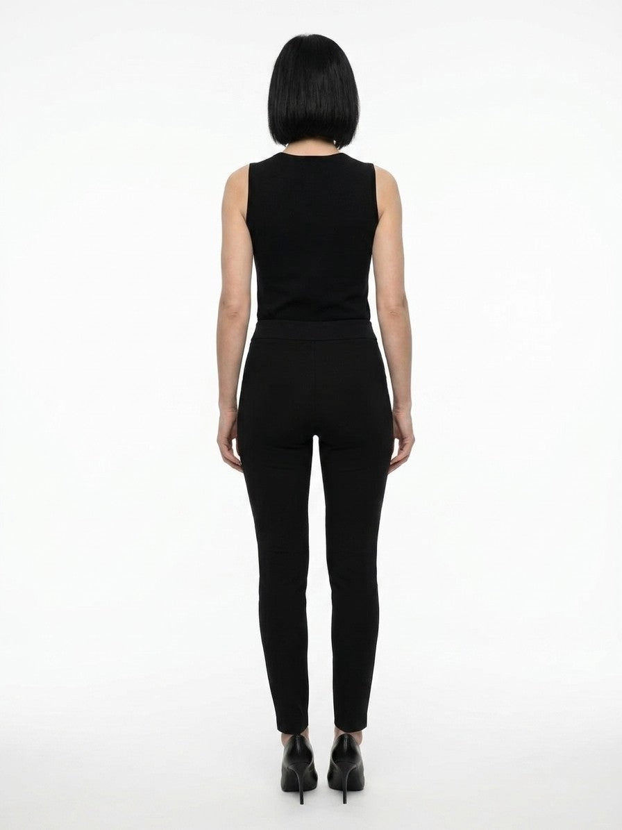 Trousers by Dolce & Gabbana for women in acetate & stretch viscose black presents a smart silhouette, meticulously detailed with a smart skinny, a smart long, and a smart .