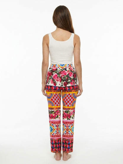 Casual Pants by Dolce & Gabbana for women in stretch cotton multicolor presents a tailored silhouette, showcasing a tailored and long cut with a refined for a truly tailored aesthetic.
