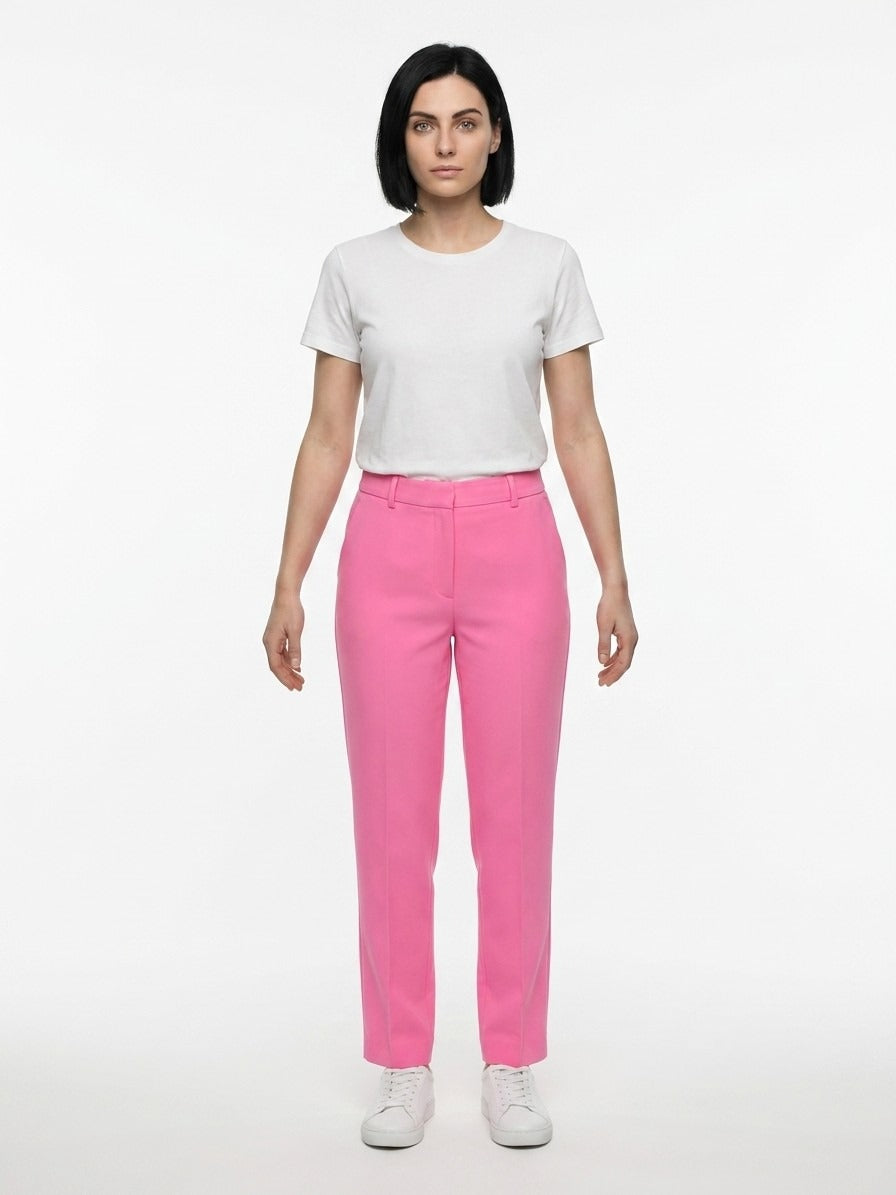 Casual Pants by Dolce & Gabbana for women in stretch polyester & viscose pink presents a tailored silhouette, showcasing a tailored and long cut with a refined for a truly tailored aesthetic.