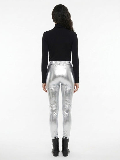 Trousers by Dolce & Gabbana for women in stretch polyester silver presents a perennial silhouette, meticulously tailored with a skinny cut, long finish, and an elegant .