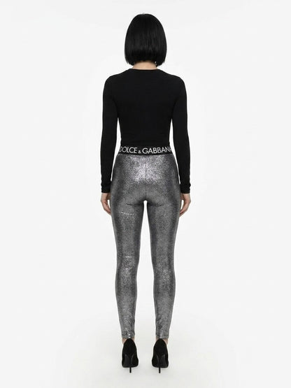 Activewear Leggings by Dolce & Gabbana for women in stretch polyamide polyester gray features an streamlined leggings and with a long cut, beautifully enhanced by performance-driven .
