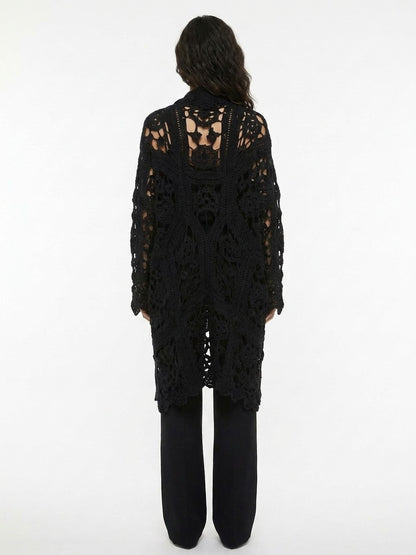 Cardigan by Dolce & Gabbana for women in virgin wool black features a dramatic silhouette, showcasing a sophisticated and dramatic detail for a timeless, premium look.