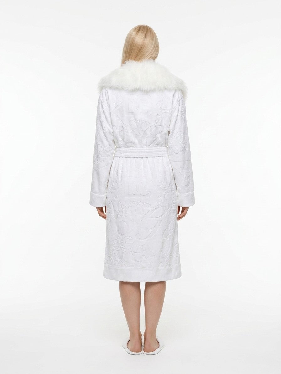 This Robe by Dolce & Gabbana for women in cotton multicolor features an sumptuous silhouette that elegantly showcases the sumptuous details and refined aesthetic of the Heart Talk Women's Cotton Robe.