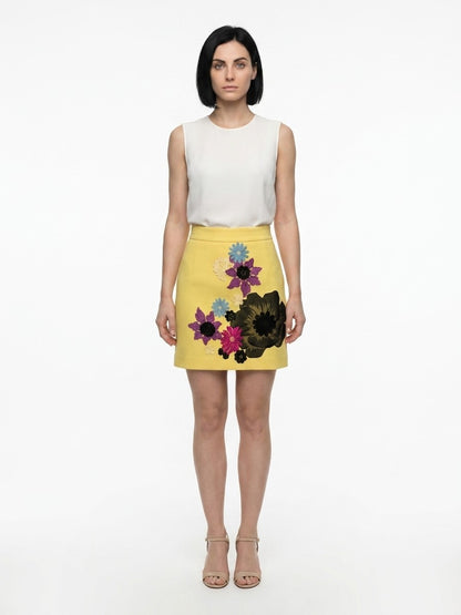 Skirt by Dolce & Gabbana for women in silk wool & elastane yellow features a contoured silhouette from the Women's Silk Wool & Elastane Mini Skirt collection, characterized by its contoured mini for a contoured finish.