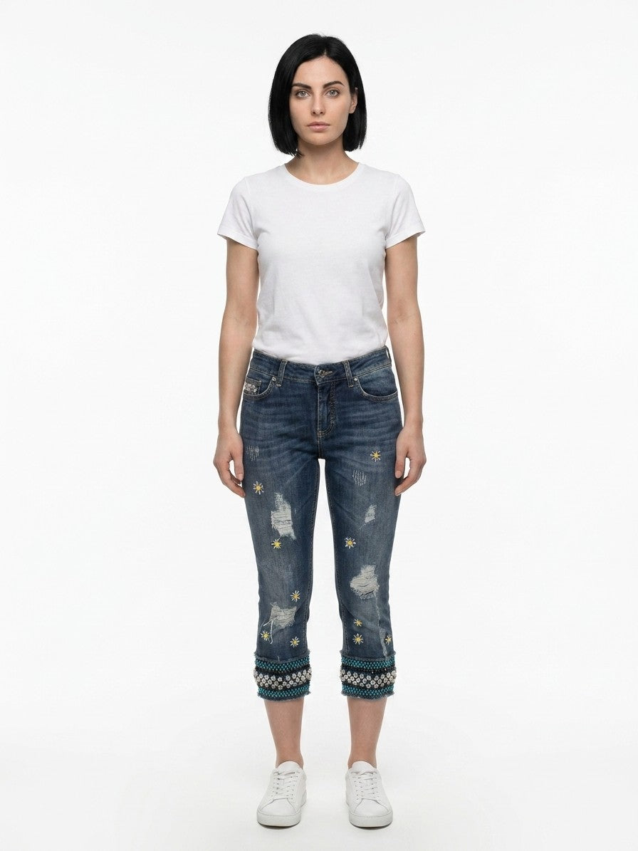 Jeans by Dolce & Gabbana for women in stretch denim cotton blue features a polished silhouette with a polished cropped, reaching a polished cropped and finished with a polished .