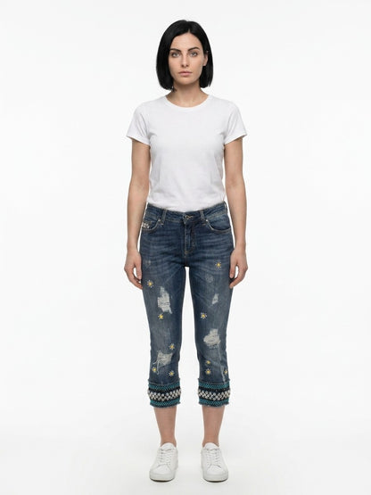 Jeans by Dolce & Gabbana for women in stretch denim cotton blue features a polished silhouette with a polished cropped, reaching a polished cropped and finished with a polished .