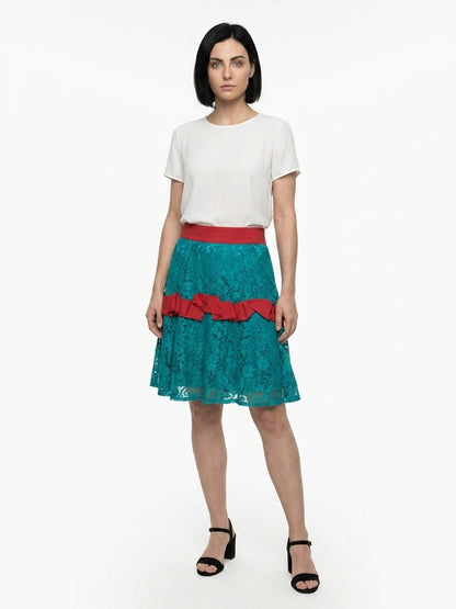 Skirt by Dolce & Gabbana for women in stretch polyamide polyester pink showcases a dramatic silhouette, artfully capturing the essence of the Women's Stretch Polyamide Polyester Skirt in a dramatic cut for a refined look.