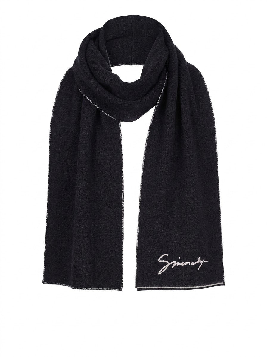 Scarf by Givenchy for men in silk wool & viscose bicolour presents a effortlessly chic silhouette, artfully capturing the essence of the effortlessly chic Silk Wool & Viscose Wrap Scarf design for a sophisticated look.