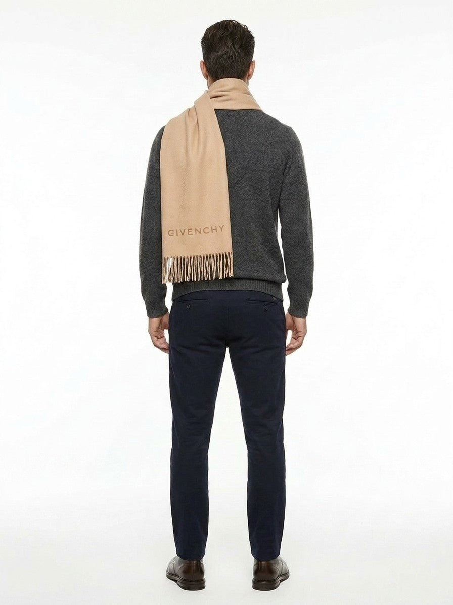 Scarf by Givenchy for men in virgin wool beige showcases a eye catching silhouette, artfully capturing the essence of the eye catching Grace Virgin Wool Scarf design for a sophisticated look.
