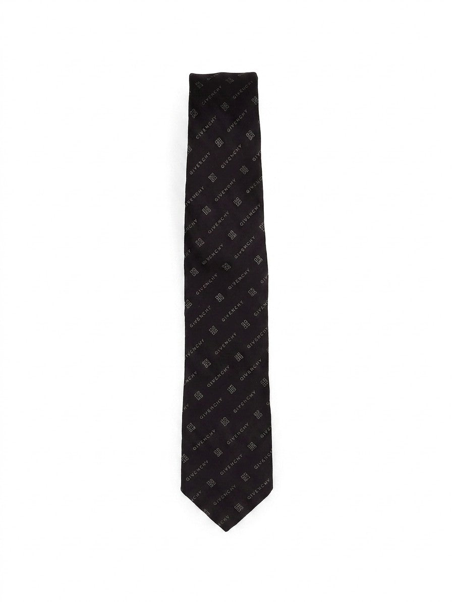 Necktie by Givenchy for men in silk gray showcases a stately silhouette, expertly detailed with a stately finish that perfectly captures the sophisticated essence of the Silk Necktie.