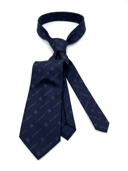 Necktie by Givenchy for men in silk blue features a distinguished silhouette, artfully capturing the essence of the distinguished Silk Necktie design for a sophisticated look.