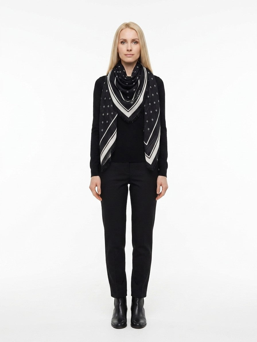 Scarf by Givenchy for women in cashmere silk bicolour showcases a eye catching silhouette, artfully capturing the essence of the eye catching Cashmere Silk Square Scarf design for a sophisticated look.