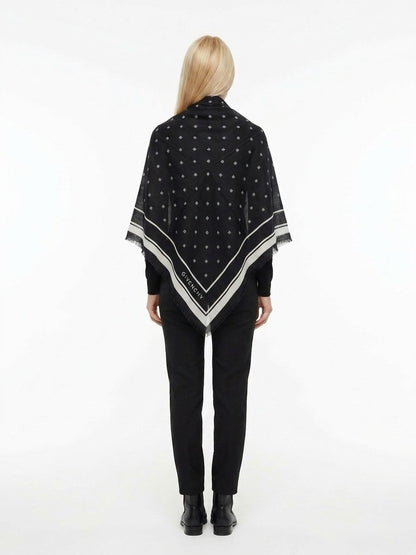 Scarf by Givenchy for women in cashmere silk bicolour features a snug silhouette, perfectly showcasing the elegant drape and premium finish of the Cashmere Silk Square Scarf.