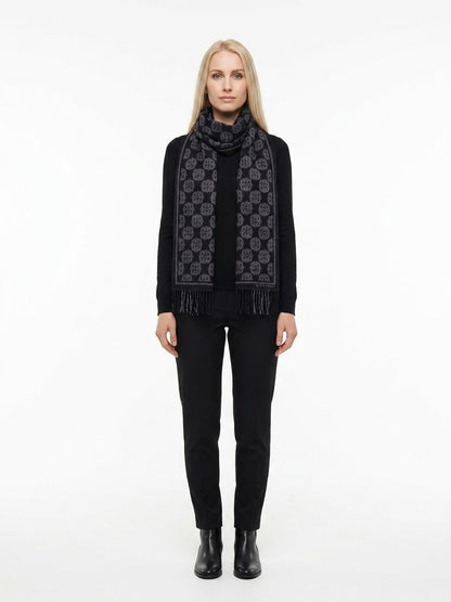 Scarf by Givenchy for women in wool black features a snug silhouette, perfectly showcasing the elegant drape and premium finish of the Essence Wool Scarf.