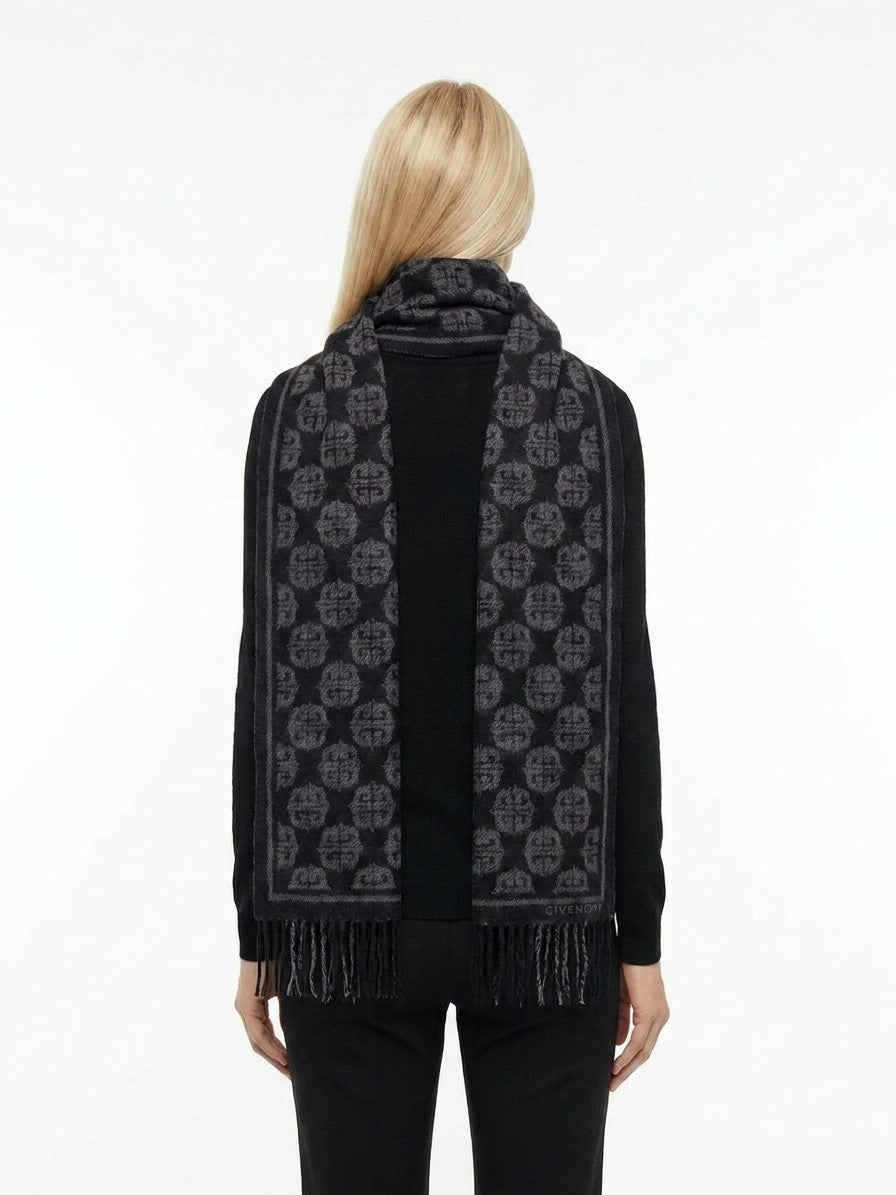 Scarf by Givenchy for women in wool black features a timeless silhouette, artfully capturing the essence of the timeless Essence Wool Scarf design for a sophisticated look.