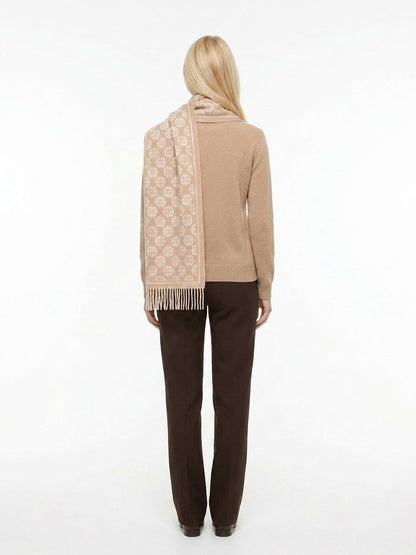 Scarf by Givenchy for women in wool bicolour features a snug silhouette, perfectly showcasing the elegant drape and premium finish of the Wool Scarf.