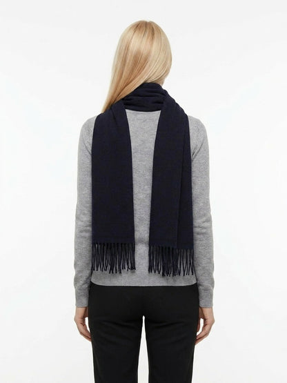 Scarf by Givenchy for women in wool bicolour & signature showcases a warm silhouette from the Wool Wrap Scarf collection, offering a warm drape that exudes sophisticated luxury.