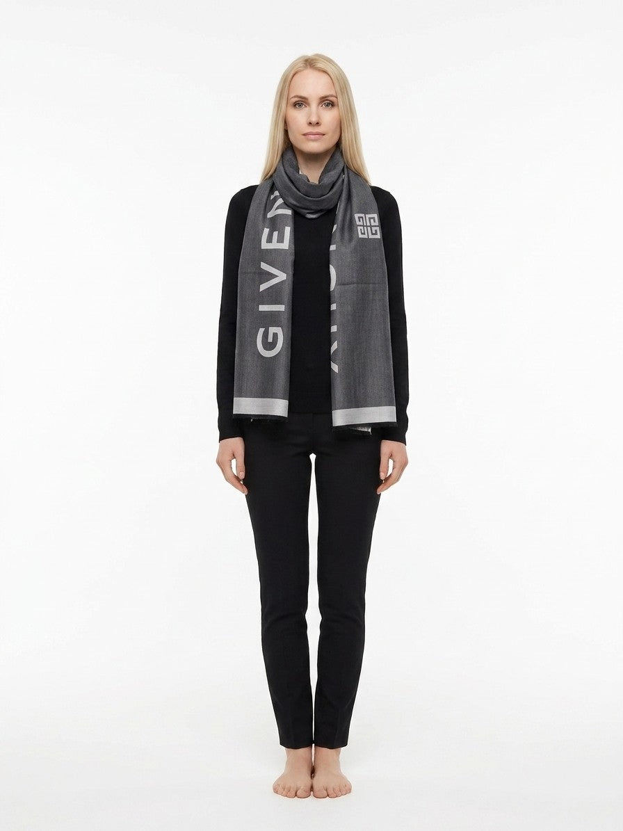 Scarf by Givenchy for women in wool & silk gray presents a cosy silhouette, artfully capturing the sophisticated design and premium aesthetic of the Wool & Silk Foulard Square Scarf.