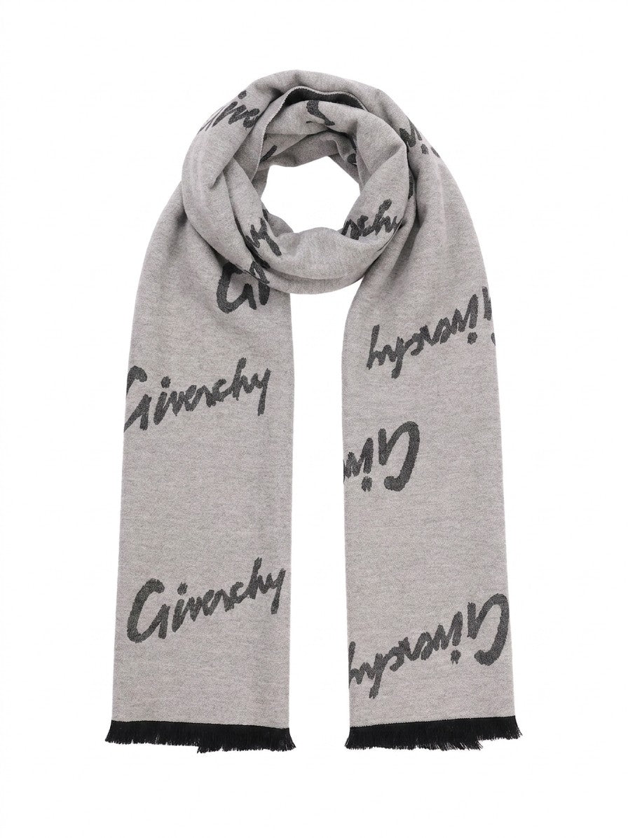 Scarf by Givenchy for women in wool & silk bicolour features a timeless silhouette, artfully capturing the essence of the timeless Wool & Silk Wrap Scarf design for a sophisticated look.
